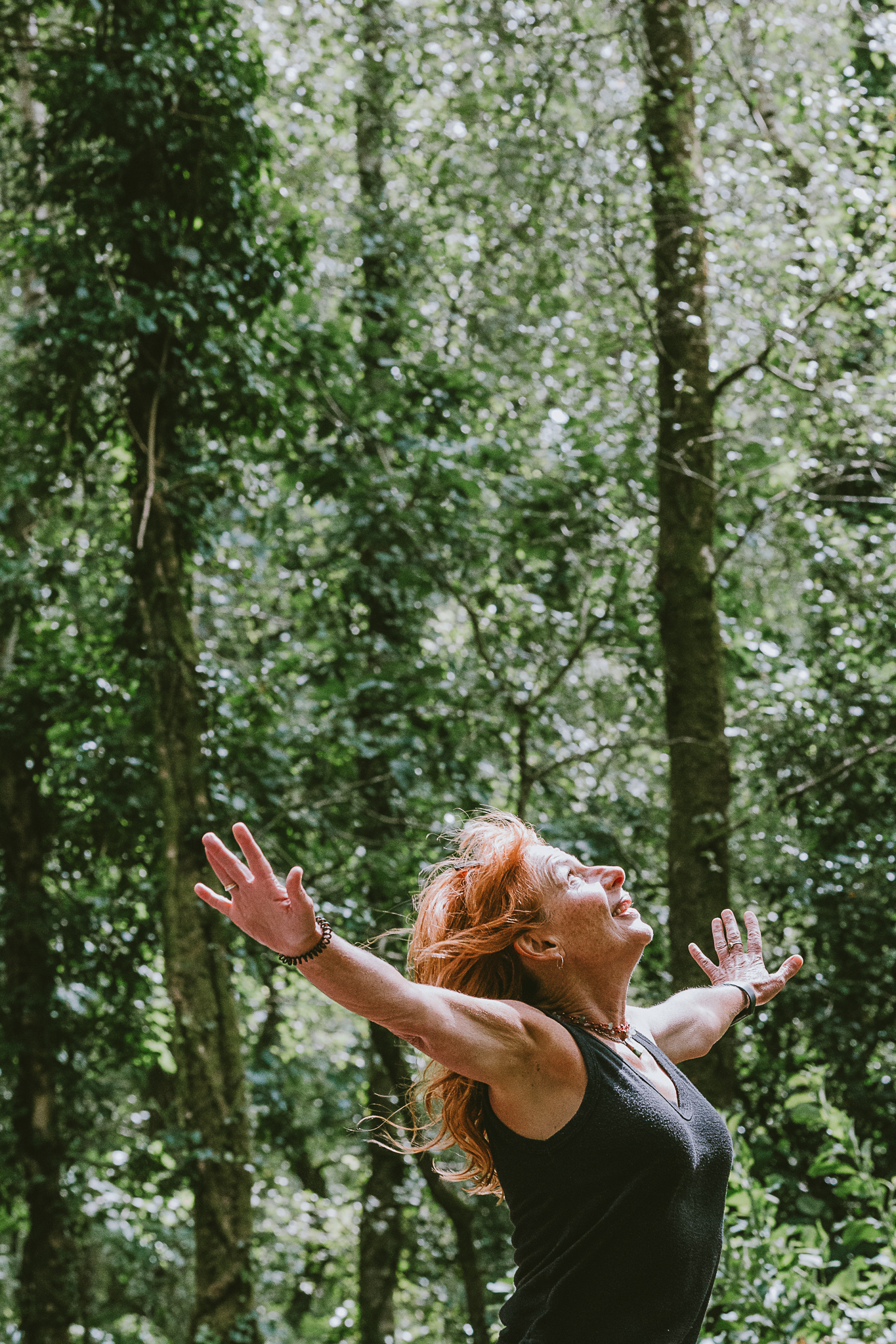 A Happy Headwork participant learning in woodland